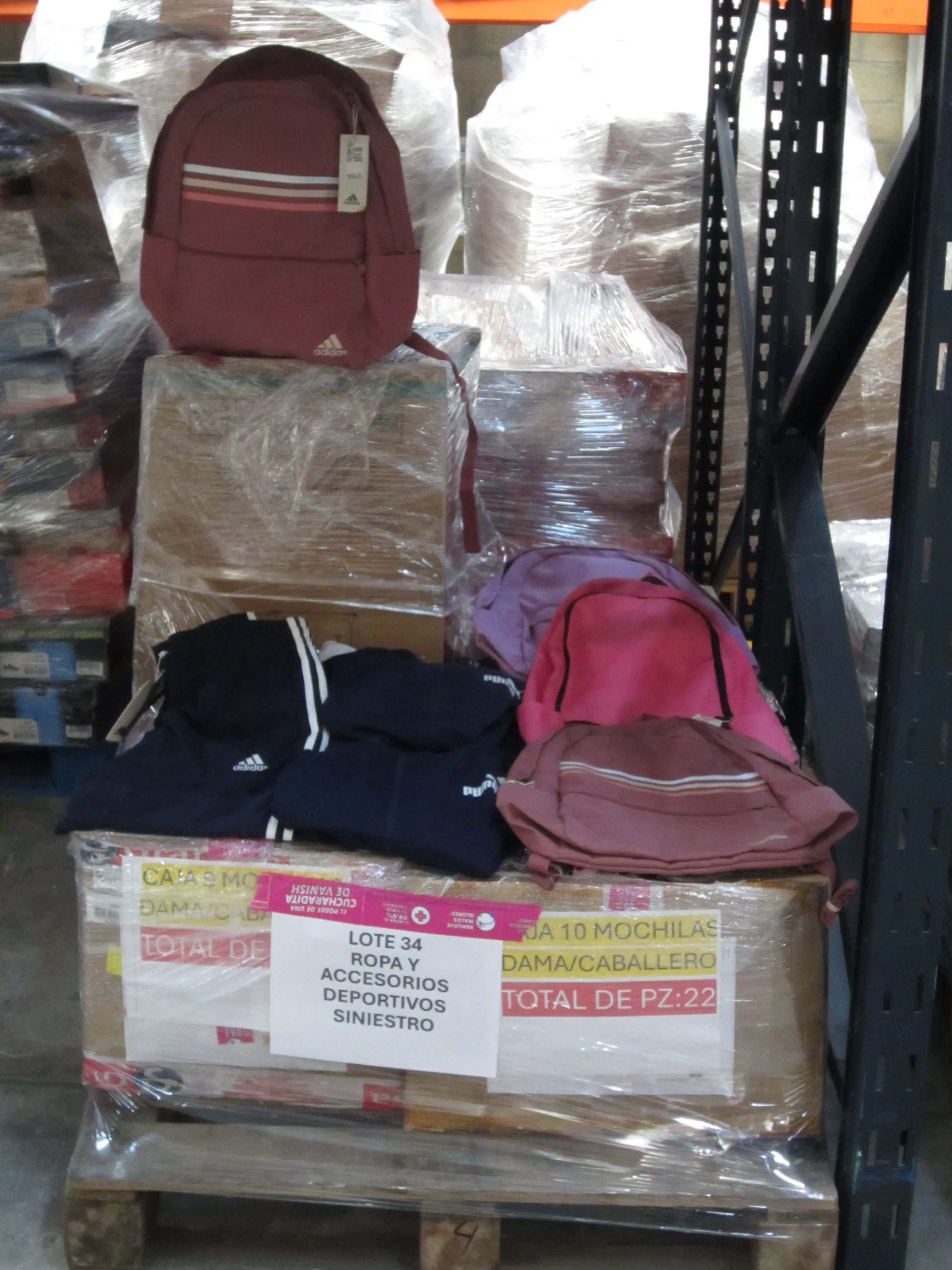 122 PZAS ACCESORIOS Y ROPA DEPORTIVA DIVERSA (SINIESTRO)