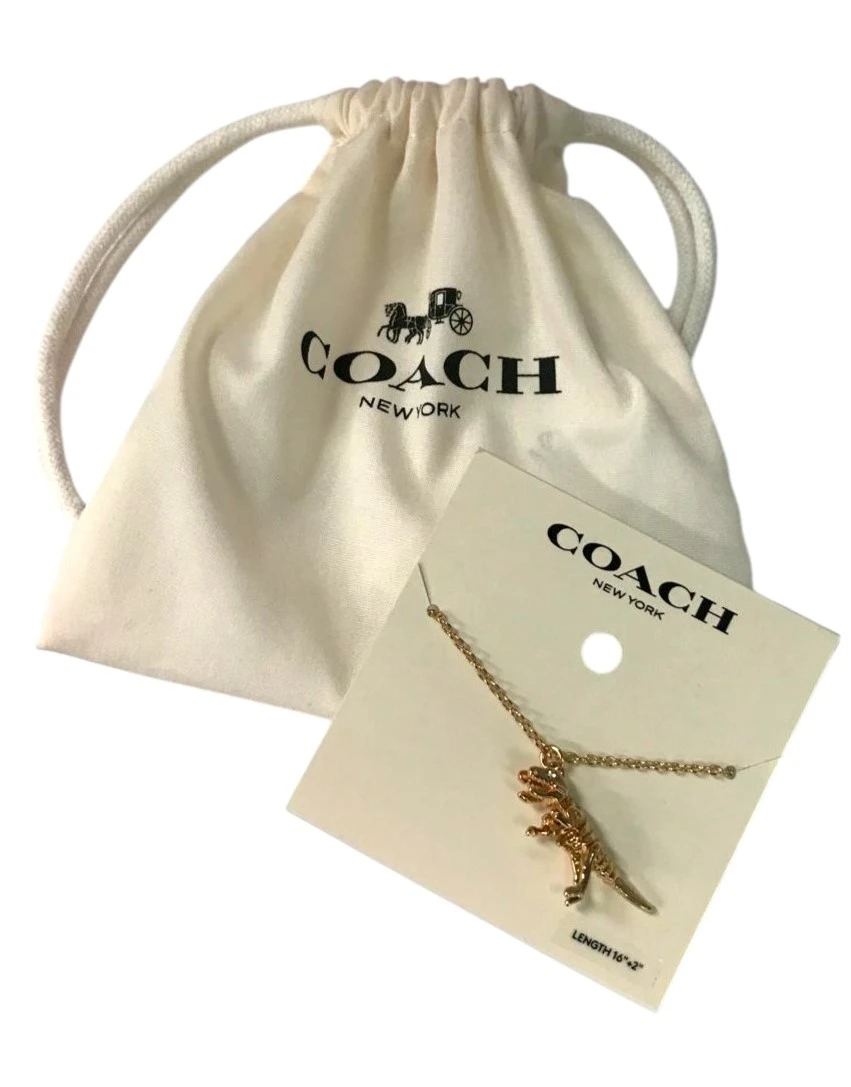 COLLAR COACH SKELETAL REXY – TONO DORADO NUEVO. — imagen 2