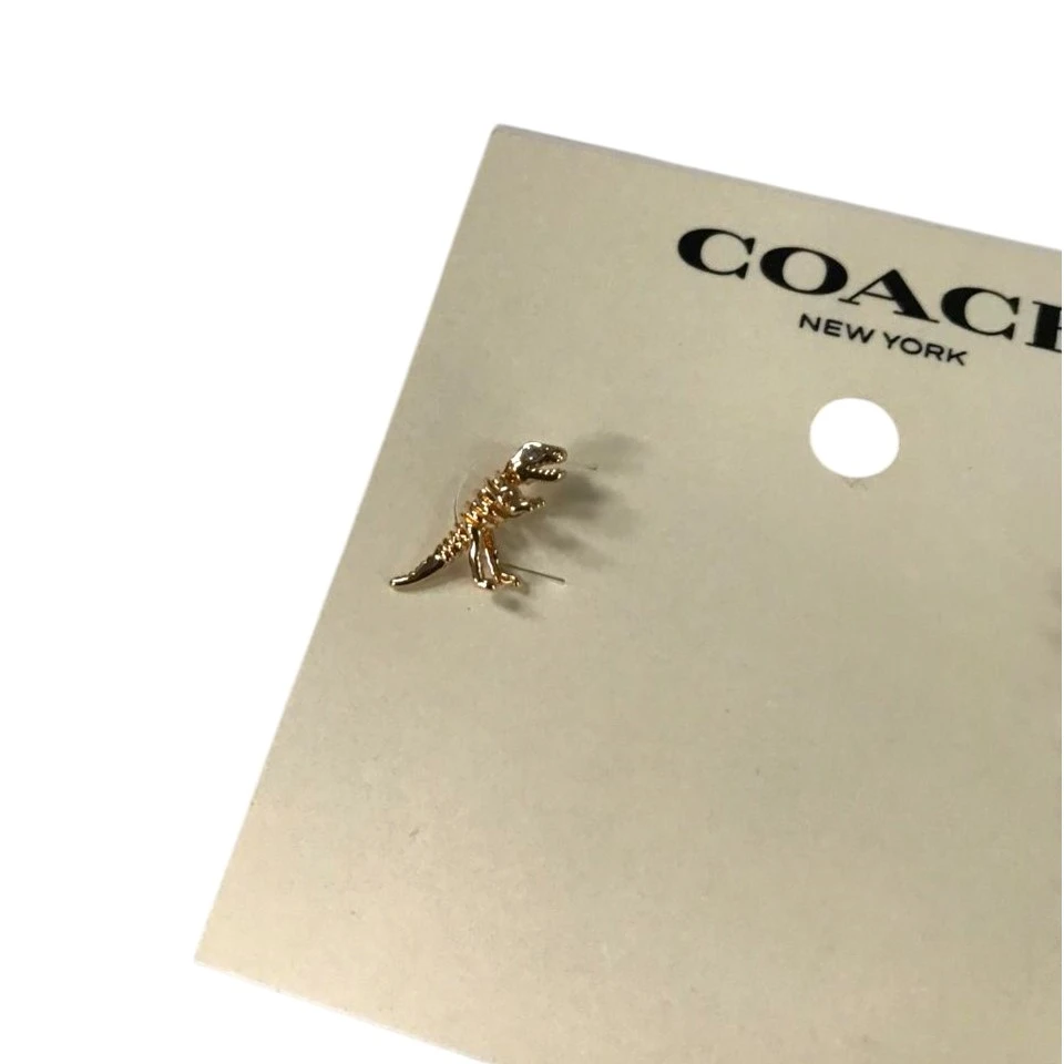 ARETES COACH SKELETAL REXY CON TACHUELAS – TONO DORADO NUEVO. — imagen 5